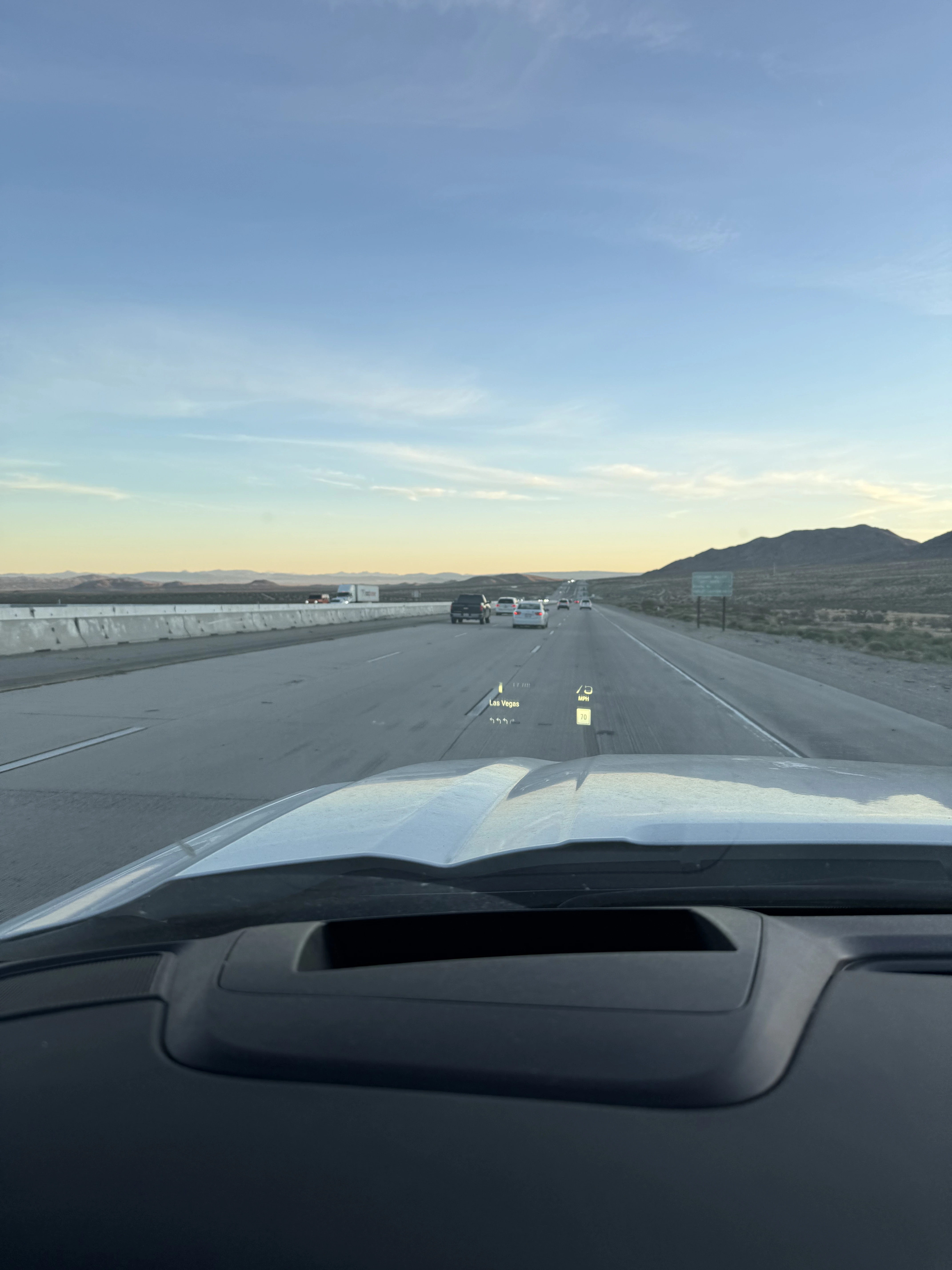 Blue skies and light clouds on the highway at 6:45am