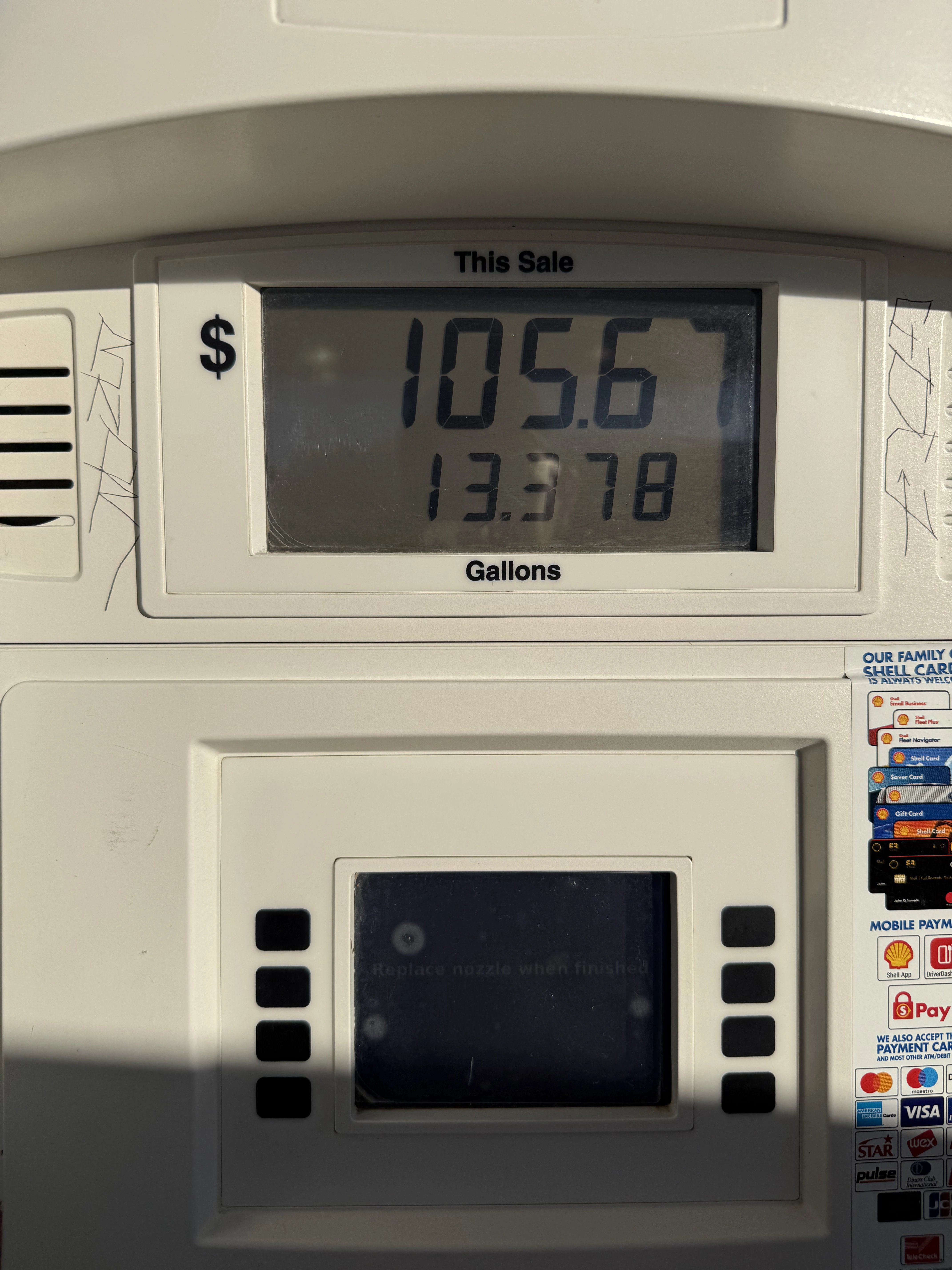 Gas pump showing $105.67 for 13.378 gallons