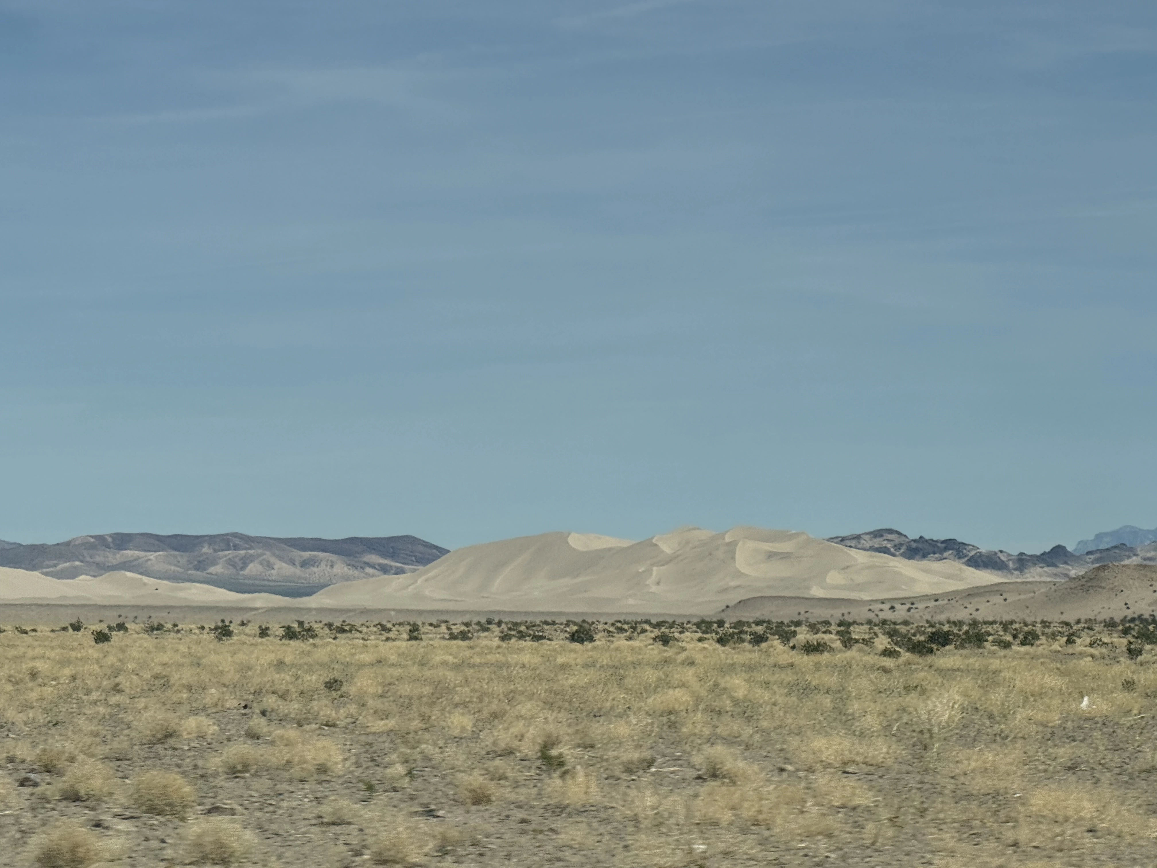Sand dunes along the road leaving Death Valley to the south